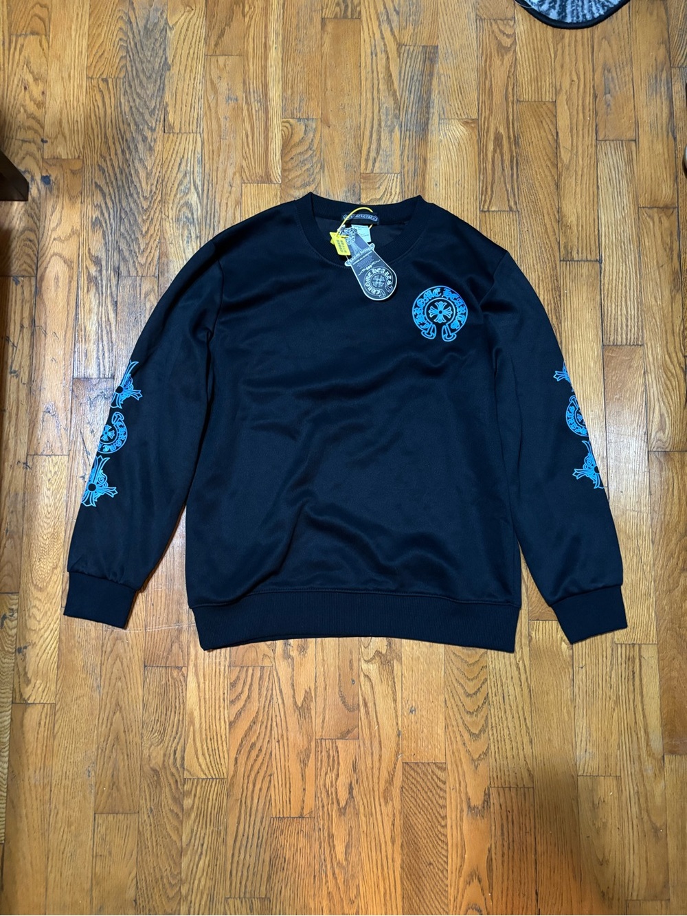 Comme des Garcons Black Crewneck Sweatshirt with Blue Graphics